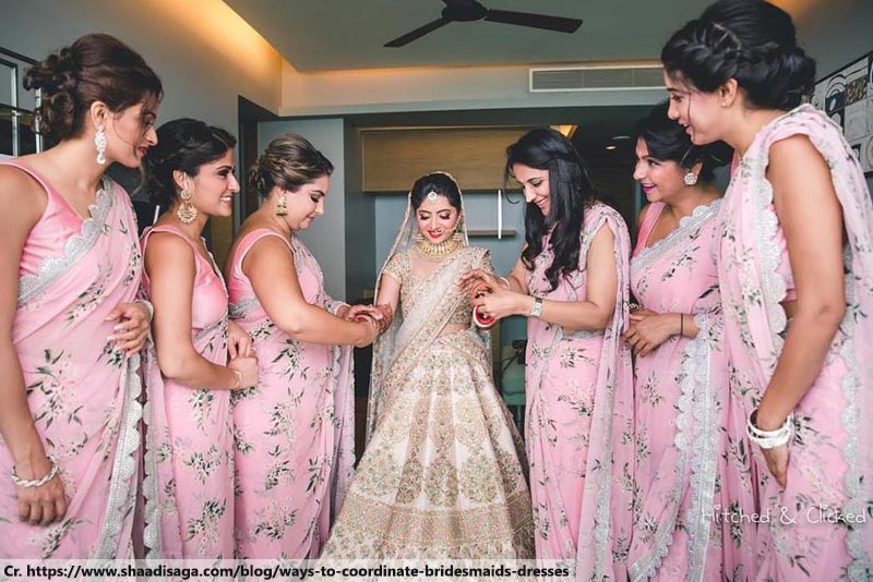 Colour-coordinated bridesmaids Indian Wedding
